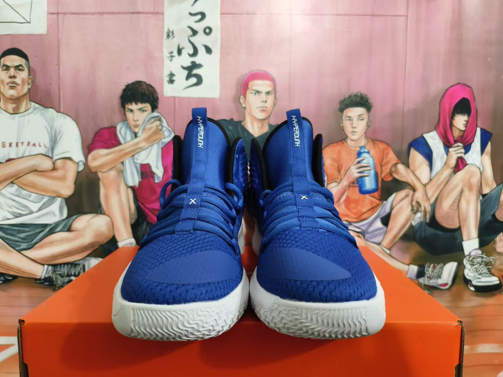 Front view of blue Nike Hyperdunk basketball shoes with white soles