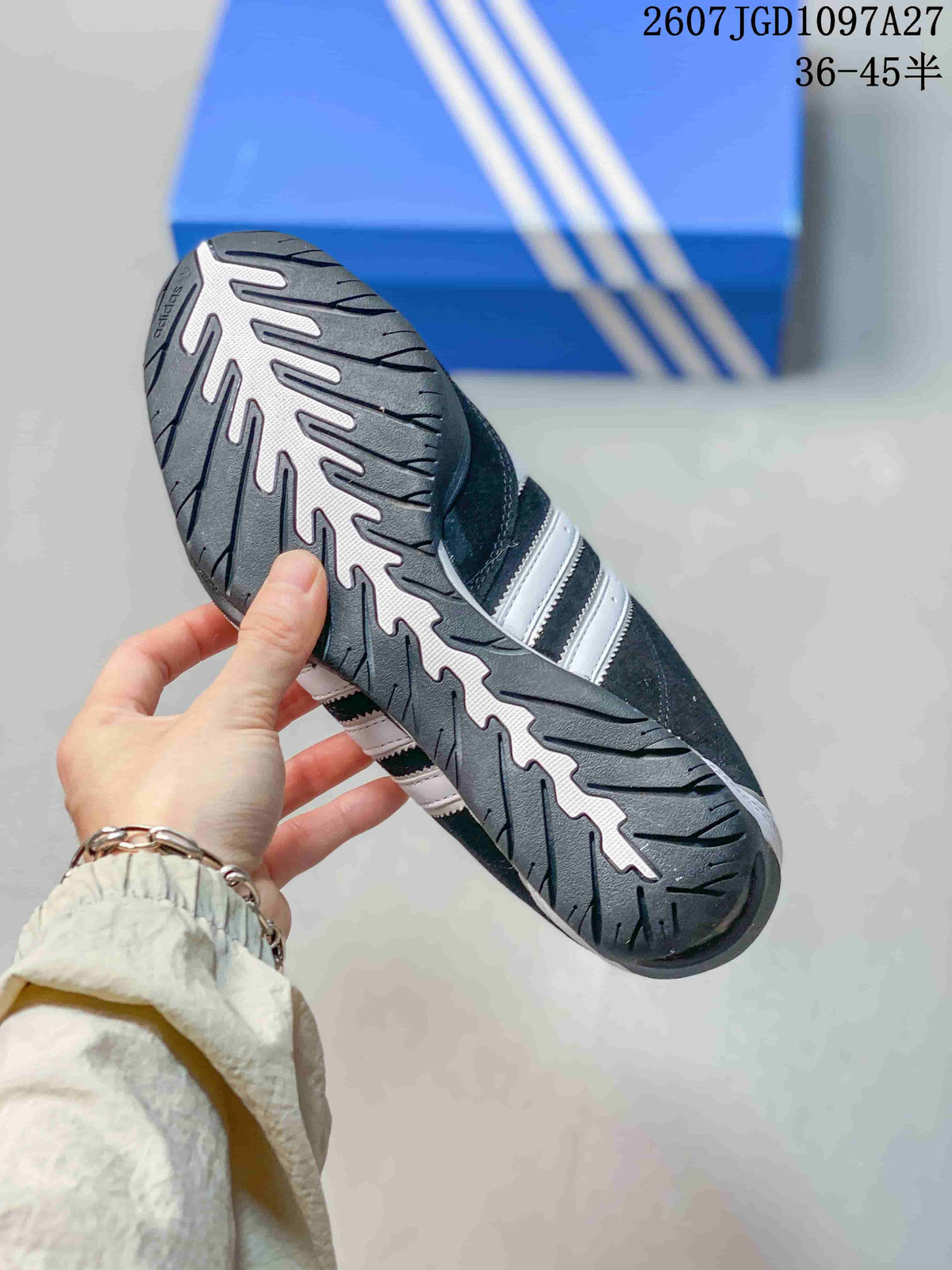 Underside view showing the textured rubber outsole and segmented tread pattern.