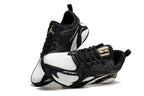 Jordan Heir shoes in black and white with gold-tone accents