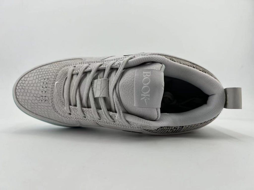 Top view showing laces, tongue branding, and patterned upper panels