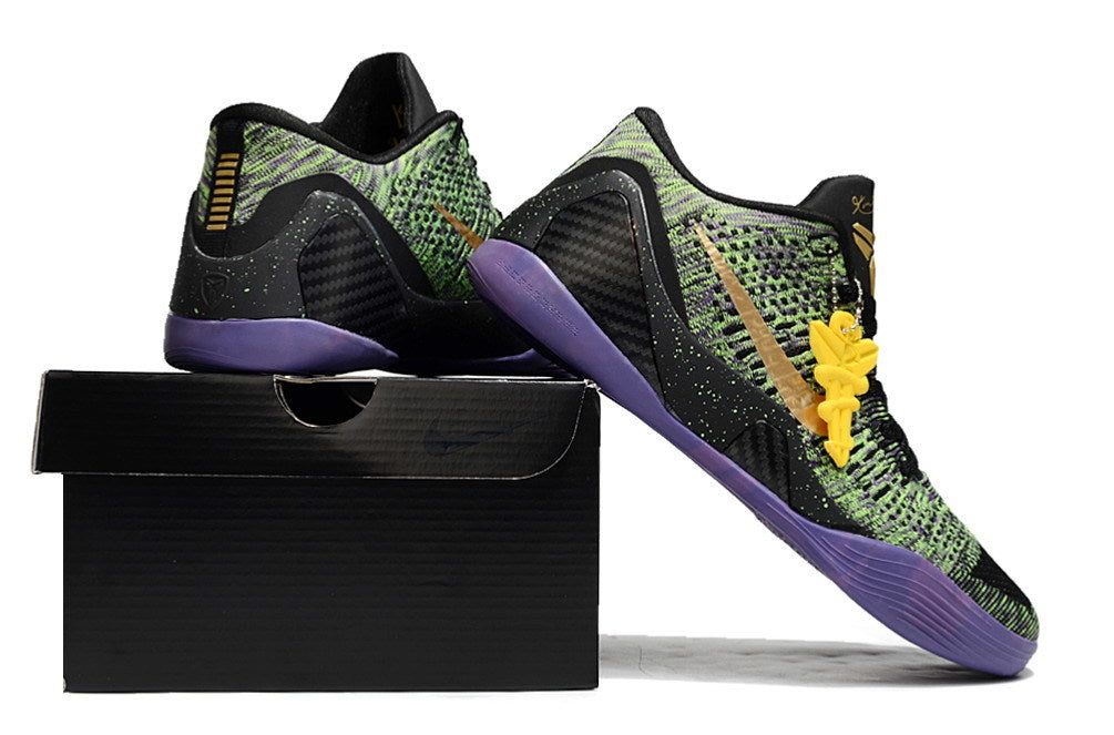 Black, green, and purple shoes displayed on a black shoebox.