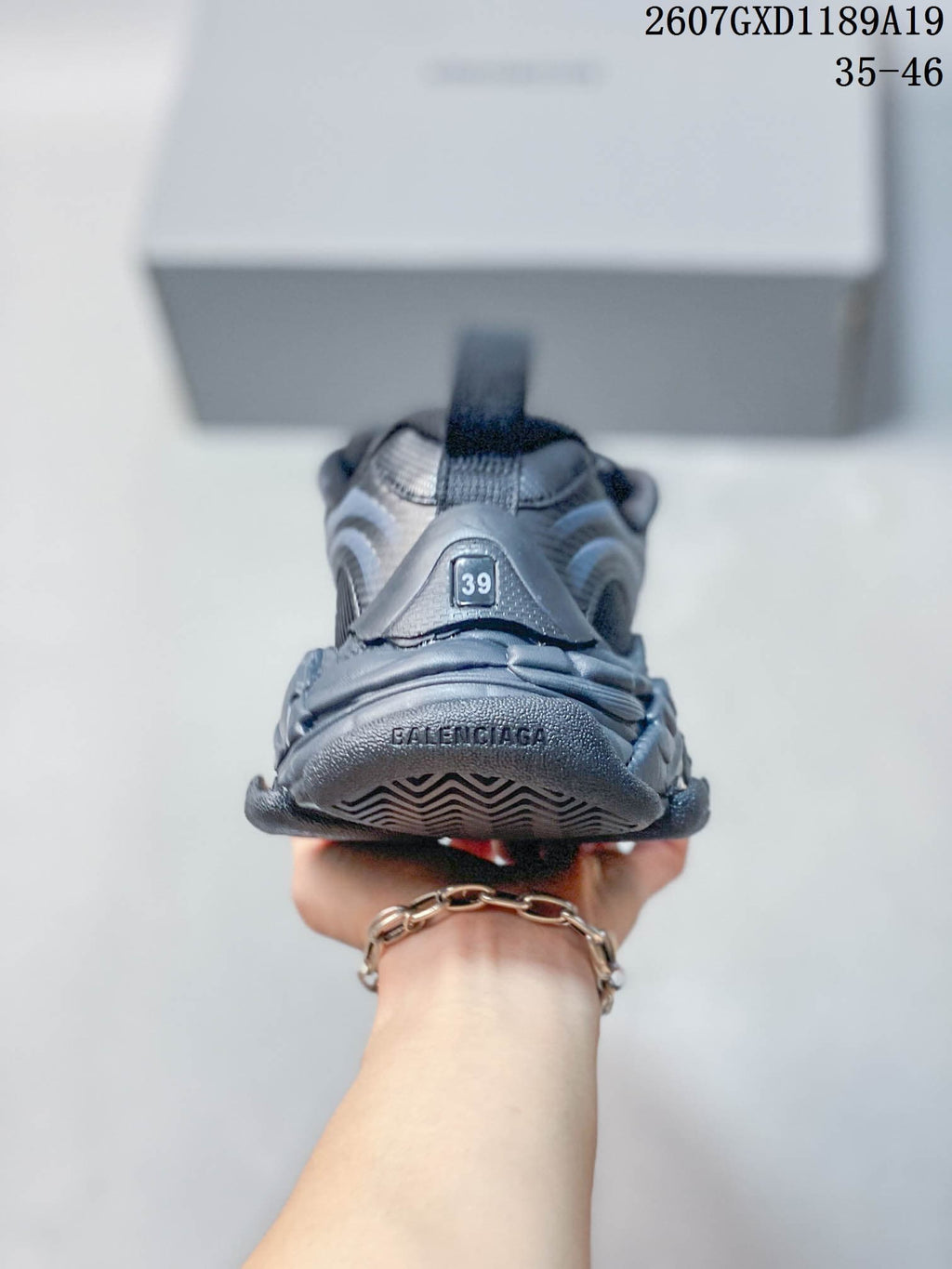 Rear view of a Balenciaga sneaker with a visible size marking of 39 and branded heel outsole.