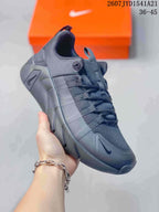 Angled side view of the black sneaker showing the lace-up upper and sculpted sole.