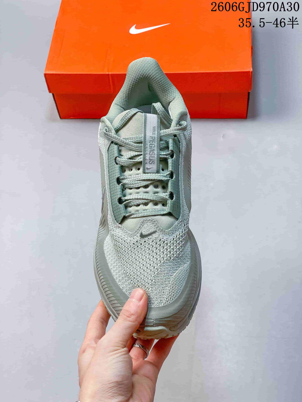 Top view highlighting the laces, tongue, and mesh-look upper