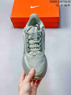Top view highlighting the laces, tongue, and mesh-look upper
