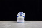 Rear view showing the padded heel, blue branding details, and light blue outsole.