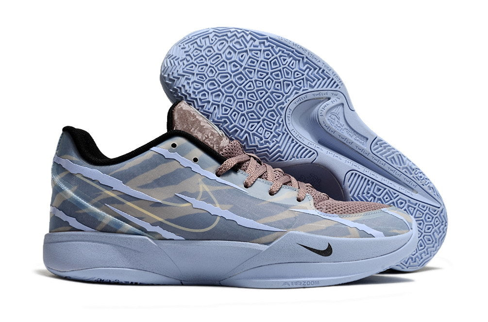 Blue-gray Ja 2 shoe side profile with the patterned outsole visible.