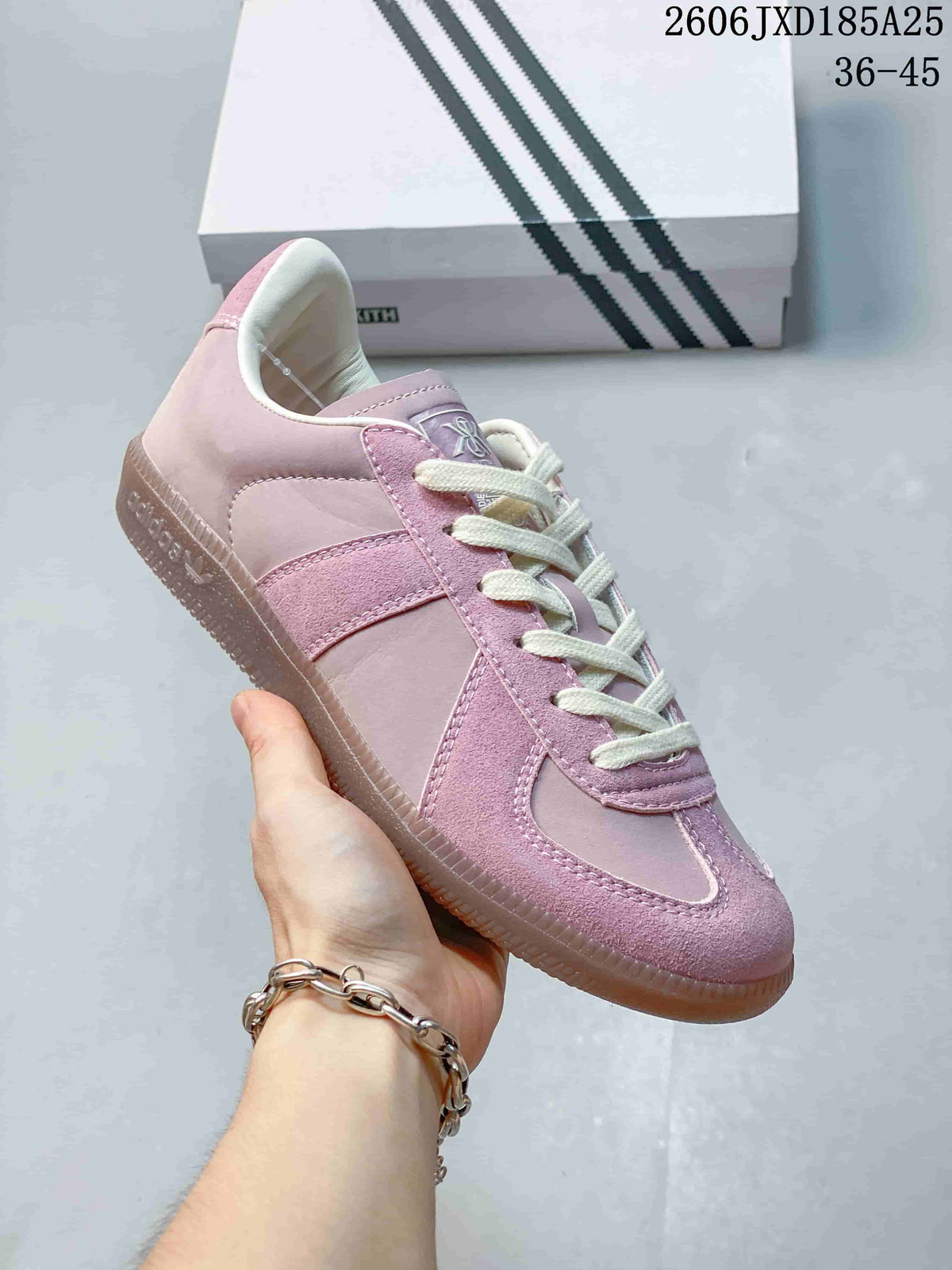 Side view of a pink adidas BW Army sneaker showing its stitched panels and gum-tone outsole