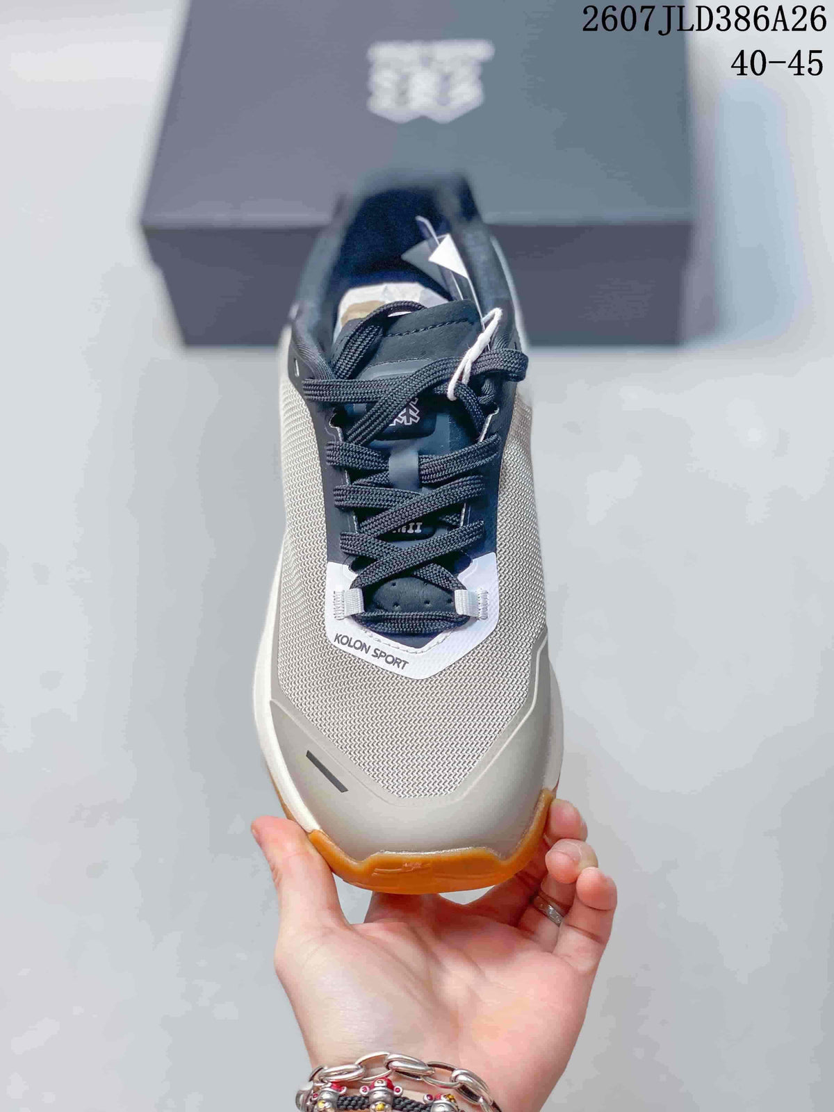 Top view of the sneaker showing the lace-up closure, padded tongue, textured toe area, and KOLON SPORT branding.