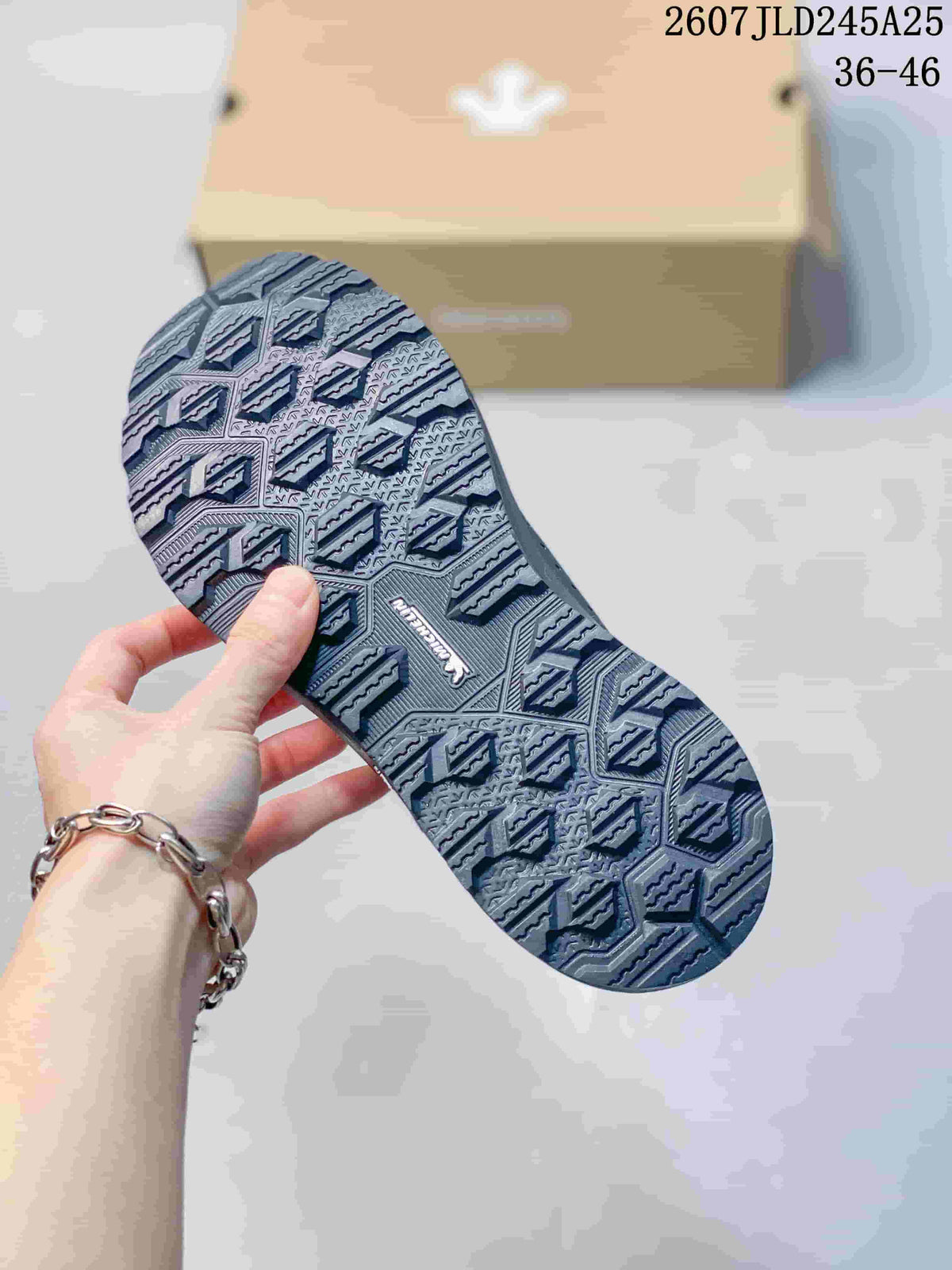 Underside view of the sneaker showing the geometric patterned rubber outsole; image text shows style code 2607JLD245A25 and size range 36–46.