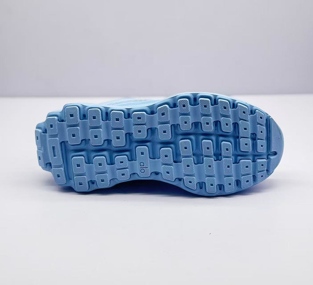 Underside view showing the patterned rubber-style outsole tread.
