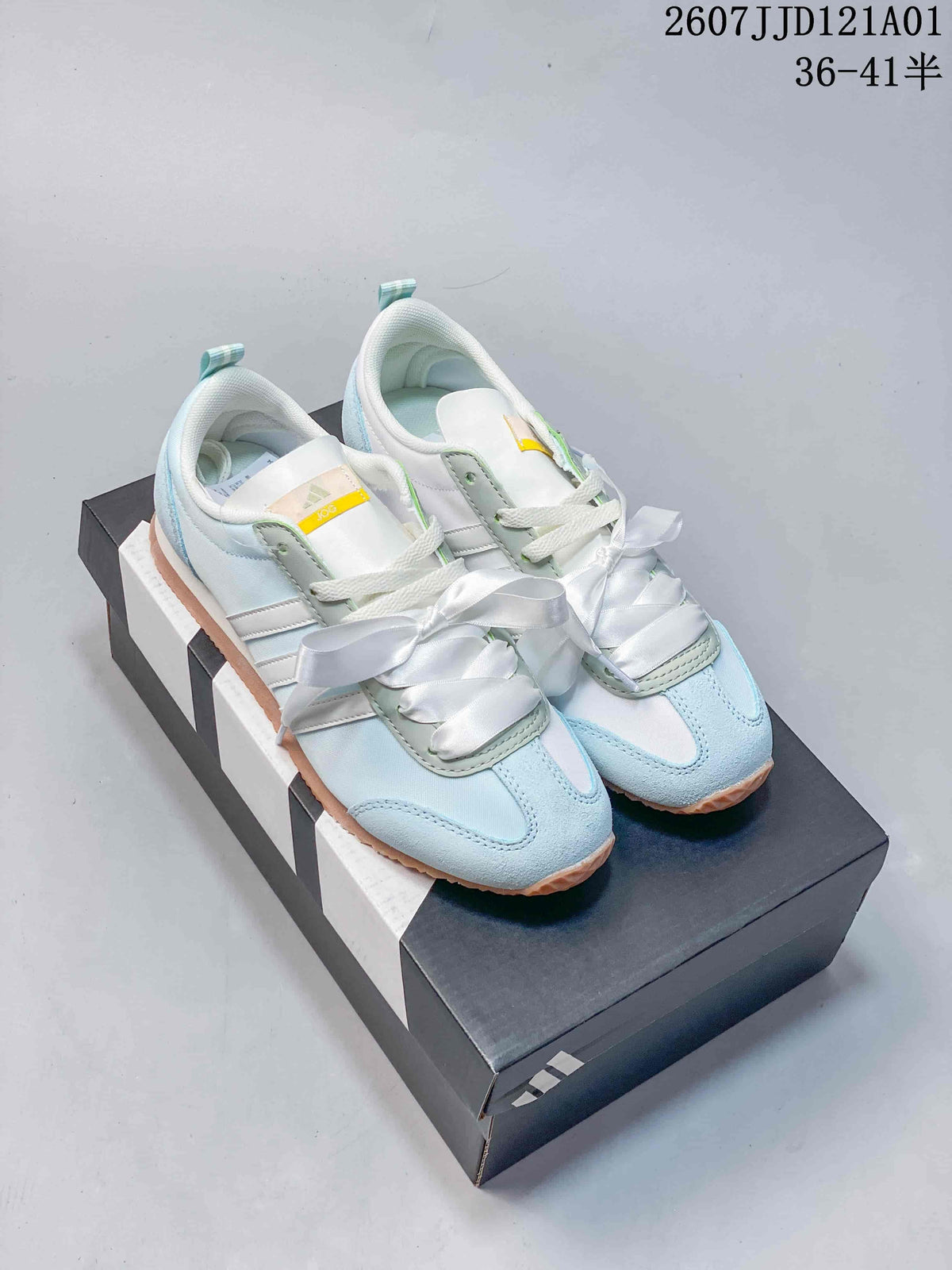Pair of pale blue JOG 2.0 sneakers with ribbon laces
