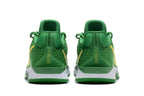 Rear view of green Nike Sabrina 2 basketball shoes with patterned side panels and white midsoles.