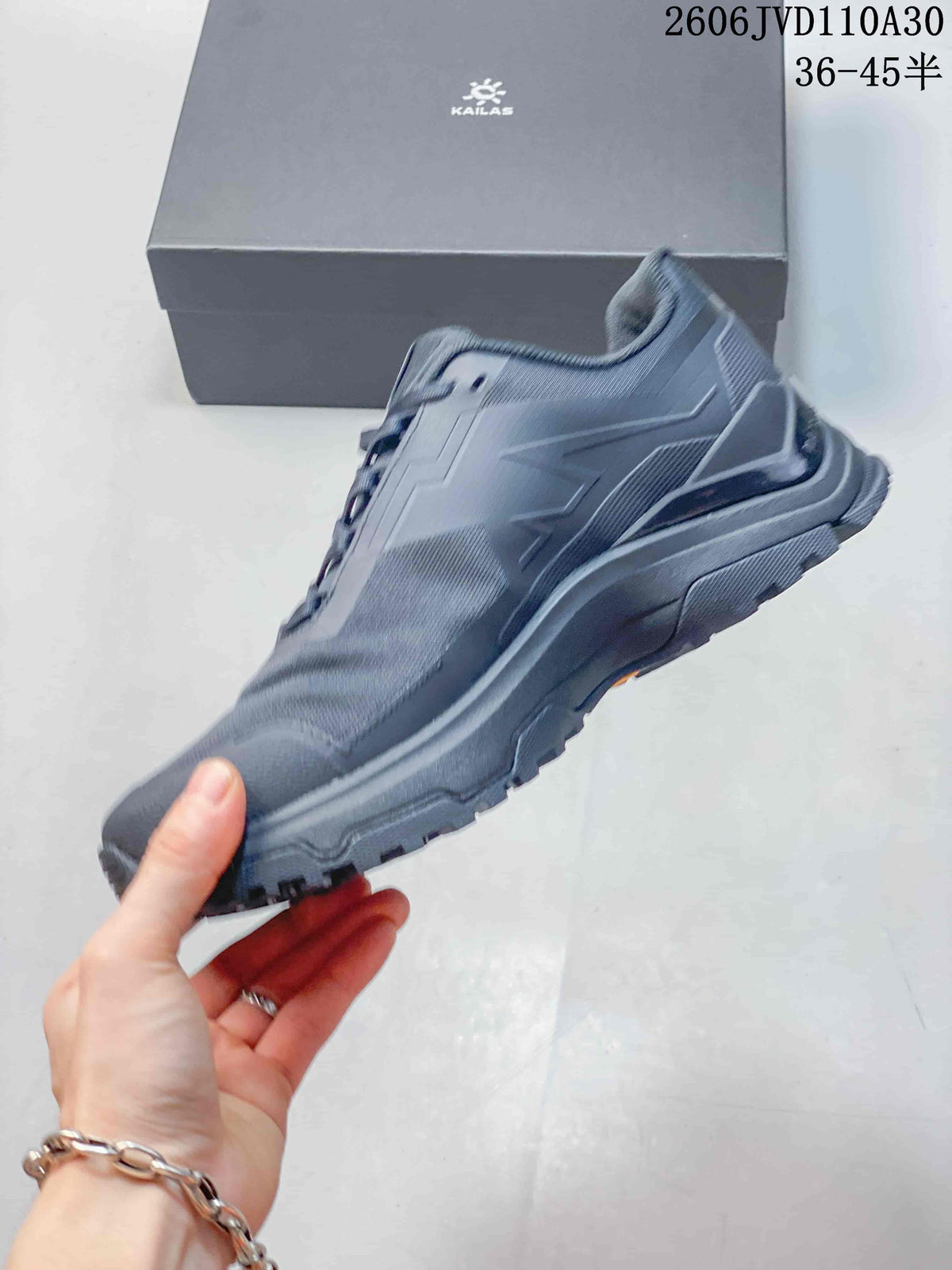 Side profile of a gray low-top outdoor shoe
