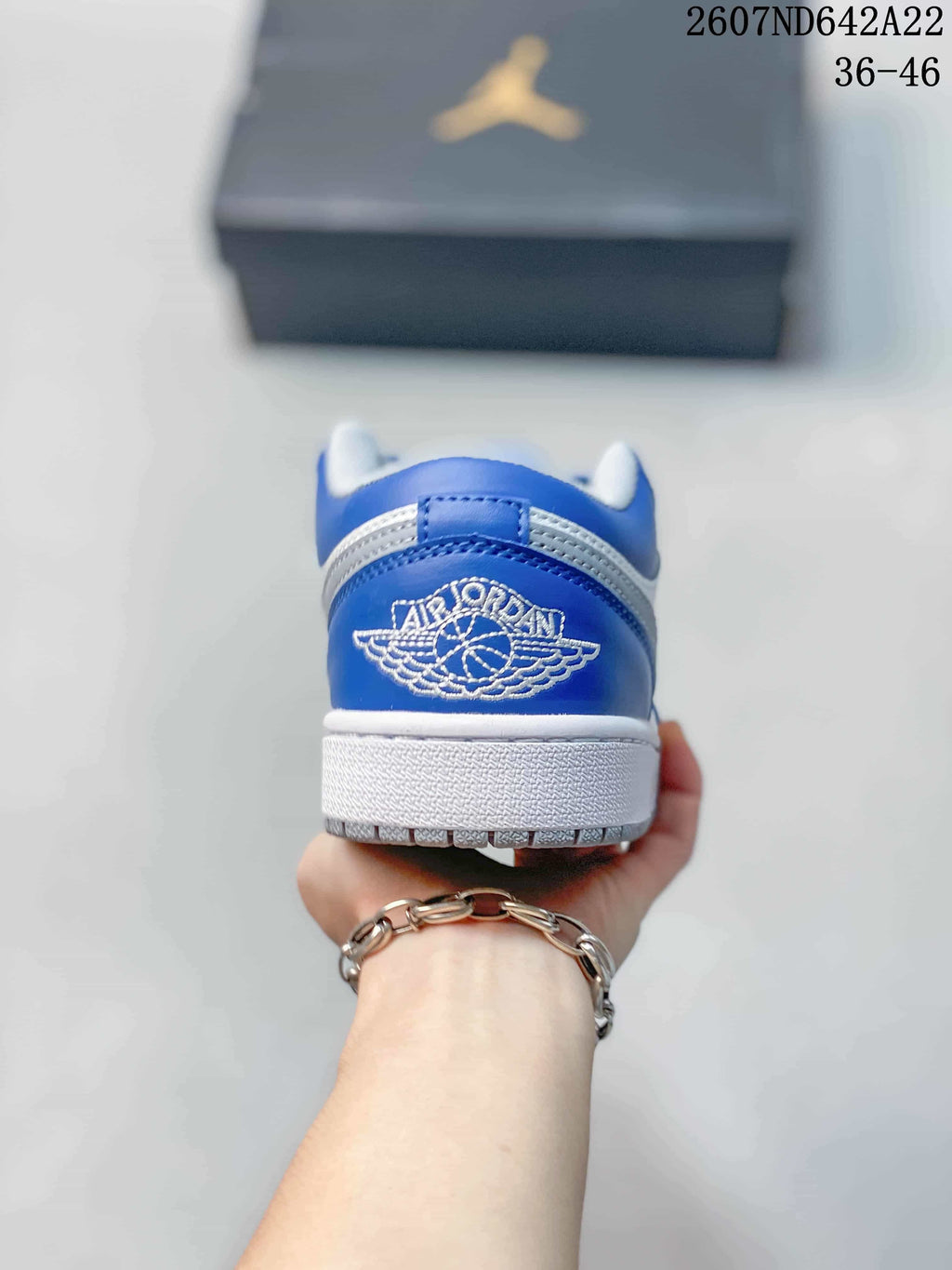 Rear view showing the Jordan Wings logo embroidered on the blue heel panel; image text shows sizes 36–46.