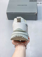 Rear view of the sneaker showing the heel, pull tab, and chunky outsole.