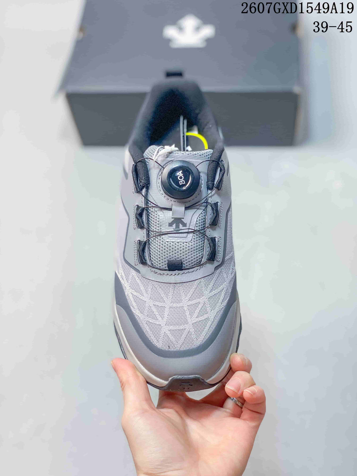 Top view of the sneaker showing the patterned upper, BOA dial, and lace-style support system.