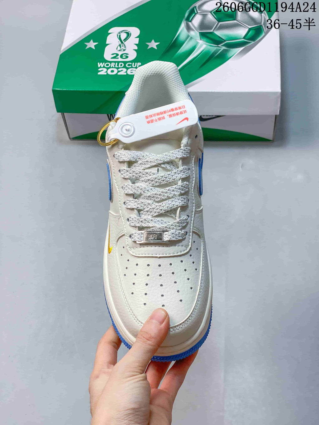 Front view showing the perforated toe, white laces and metal lace detail.