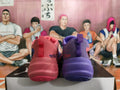 Rear view of pink and purple basketball sneakers with heel pull tabs