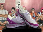 Pair of white and purple Nike basketball shoes shown from multiple angles.