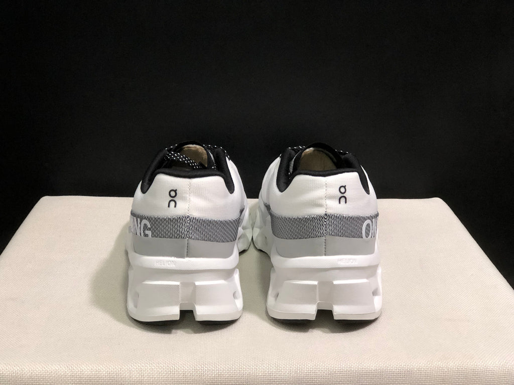 Rear view of the white On Cloudmonster 2 shoes