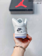 Rear view of the white sneaker showing the heel branding and padded collar.