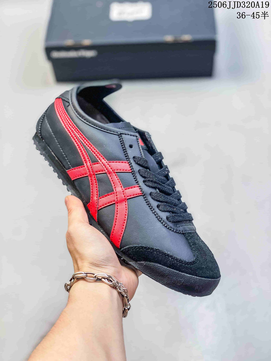Dark gray low-top sneaker with bright red side stripes and black laces
