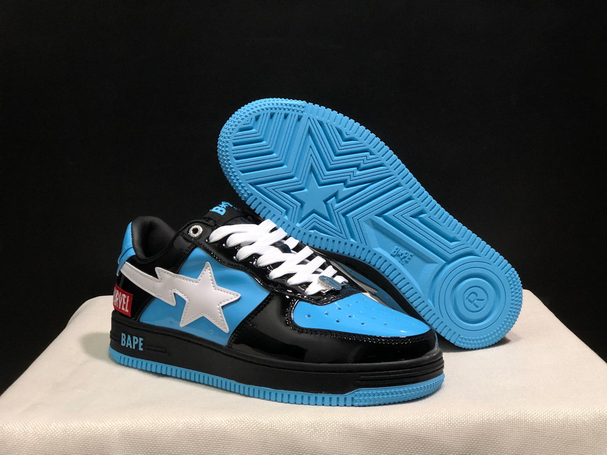 Angled view showing the black and blue sneakers, white star motifs, and blue patterned outsole.