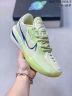 Angled side view of the Nike basketball shoe showing the mesh upper, blue swoosh, bright green midsole accent, and translucent outsole.