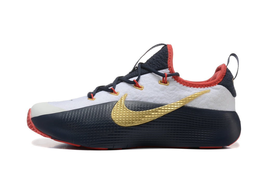 Side profile of a white and navy LeBron TR1 shoe with gold accent