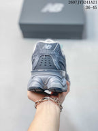 Rear view highlighting the padded collar, heel branding, and sculpted heel section.