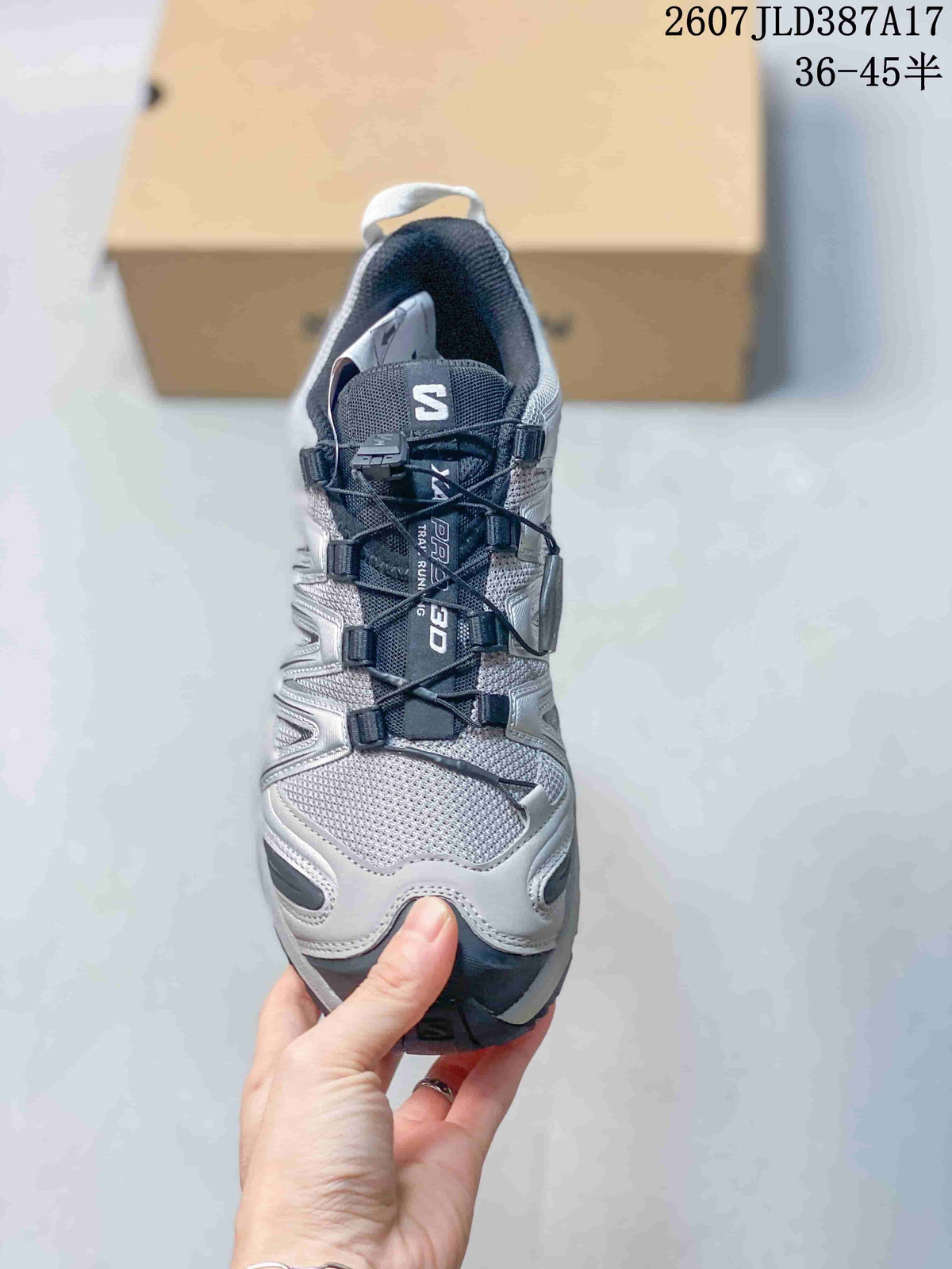 Top view of the Salomon XA Pro 3D sneaker showing the mesh-style toe area, black tongue, quick-lace toggle, and branded overlays.