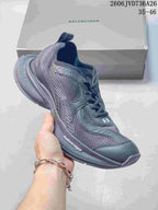 Dark gray mesh sneaker with a chunky sole