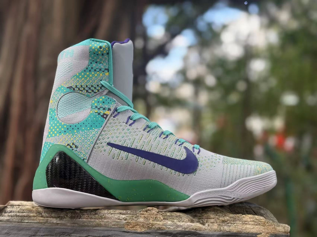 Opposite side view showing the patterned turquoise panels and purple Swoosh