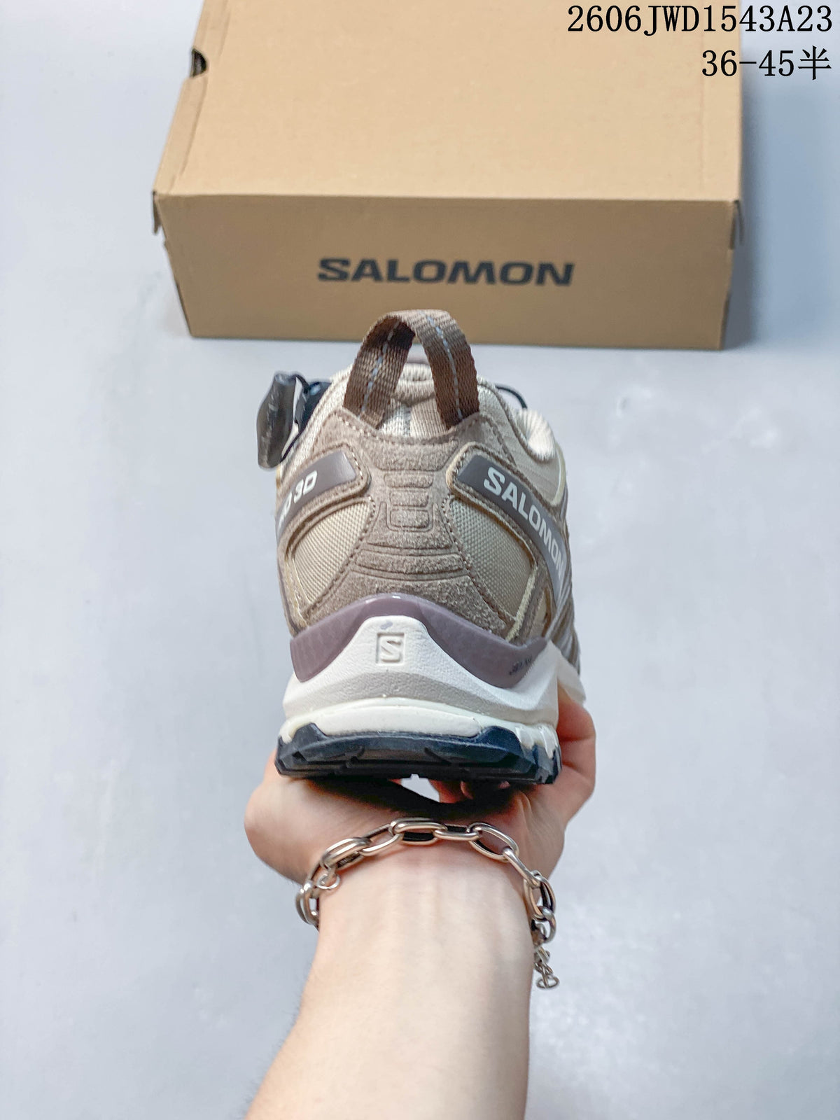 Rear view of the beige Salomon XA Pro 3D shoe