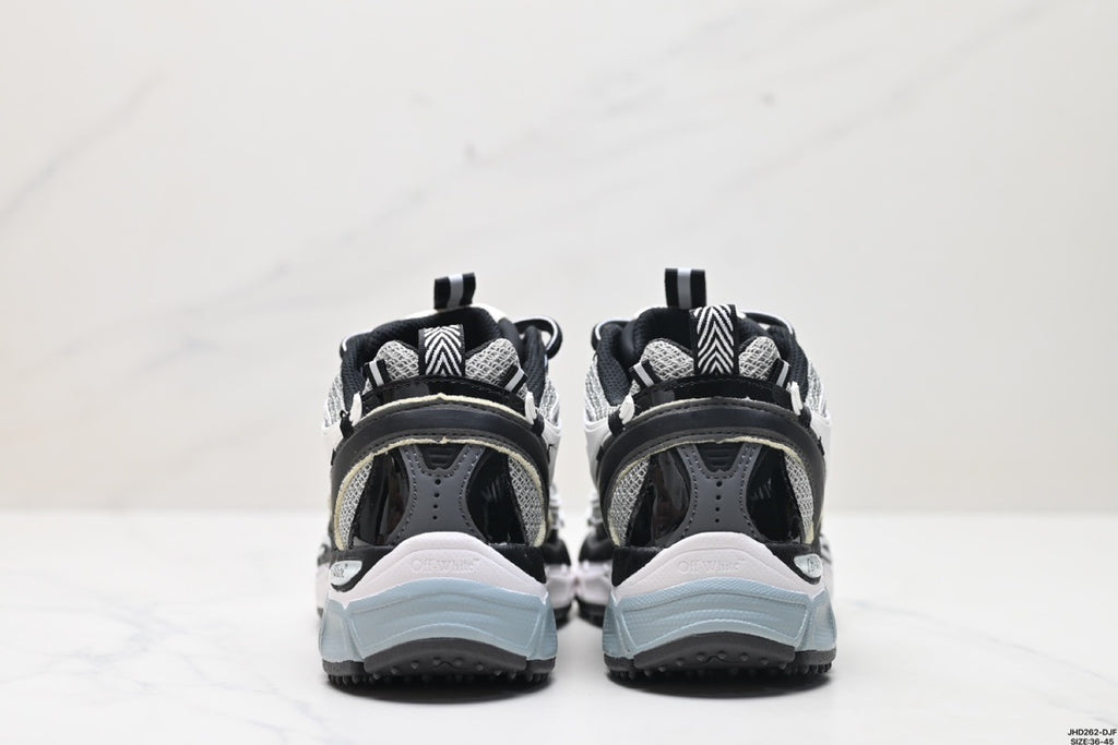 Rear view showing pull tabs, black heel panels, and pale blue-grey outsole sections.