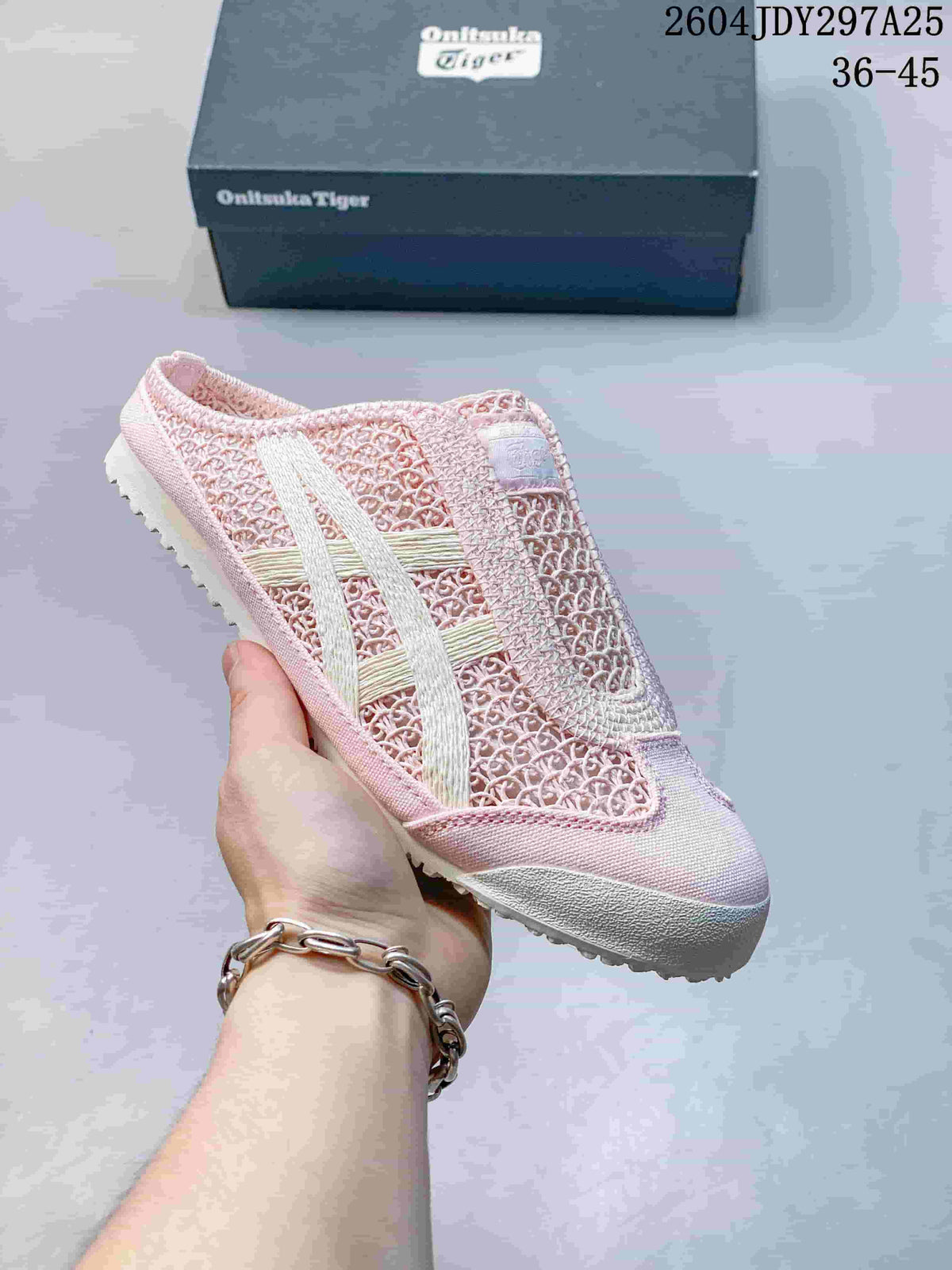 Pink Onitsuka Tiger Mexico 66 Sabot sneaker with light side stripes, shown with its box; the image shows style code 2604JDY297A25 and size range 36–45.