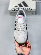 Front view showing the rounded toe, white laces, and Adidas tongue branding.