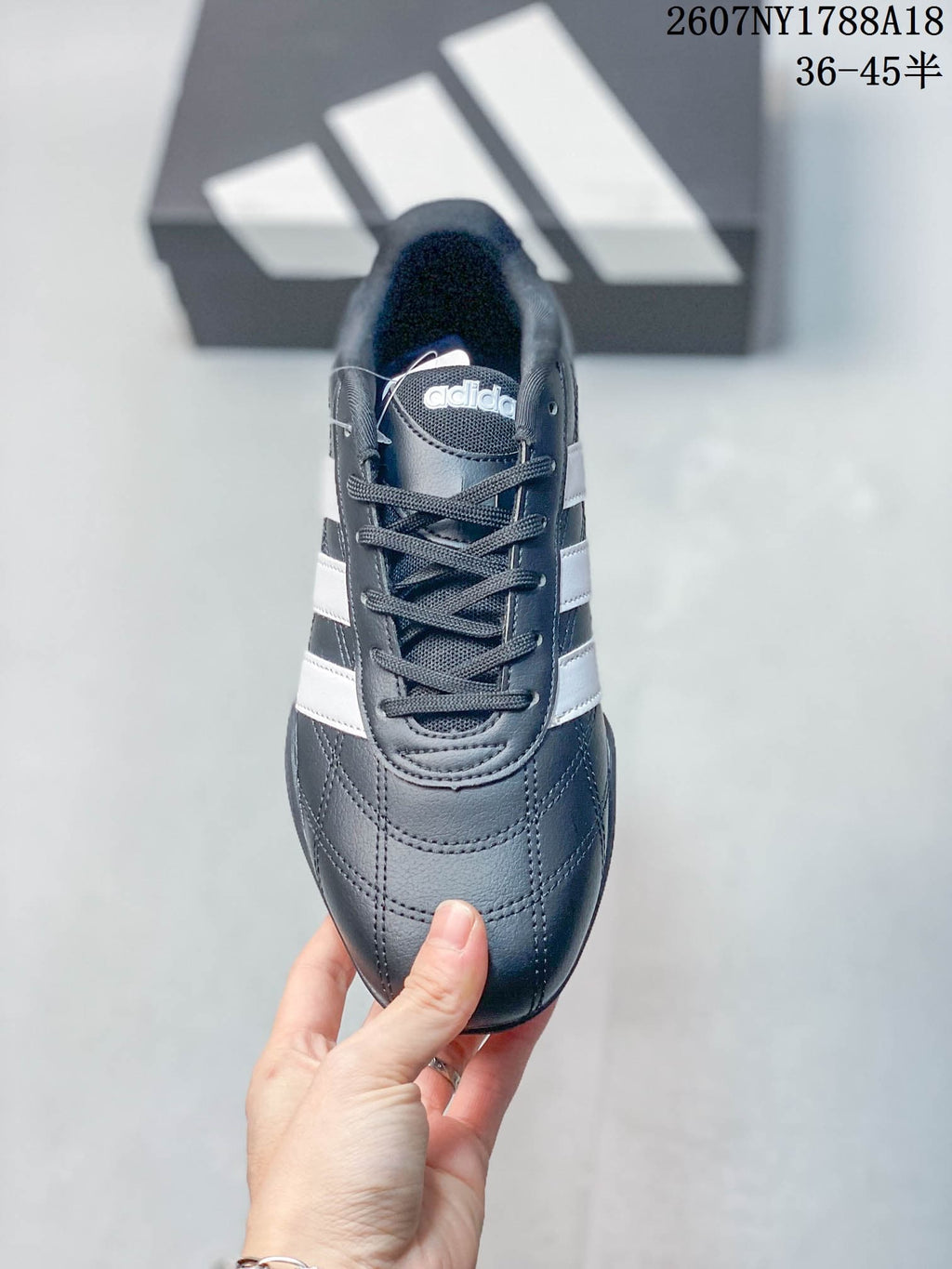 Top view showing the lace-up front, rounded toe and adidas tongue branding.