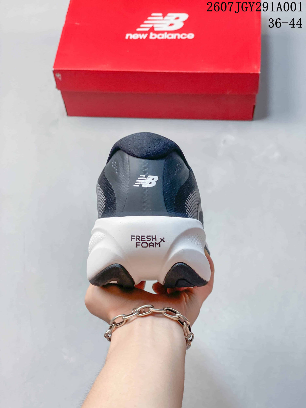 Rear view of the shoe showing the New Balance logo and Fresh Foam marking on the white midsole.