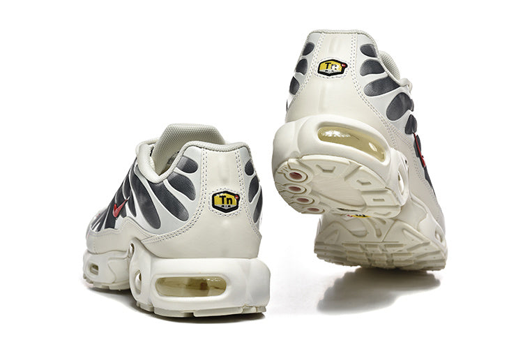 Nike Air Max Plus Sneakers in White and Gray