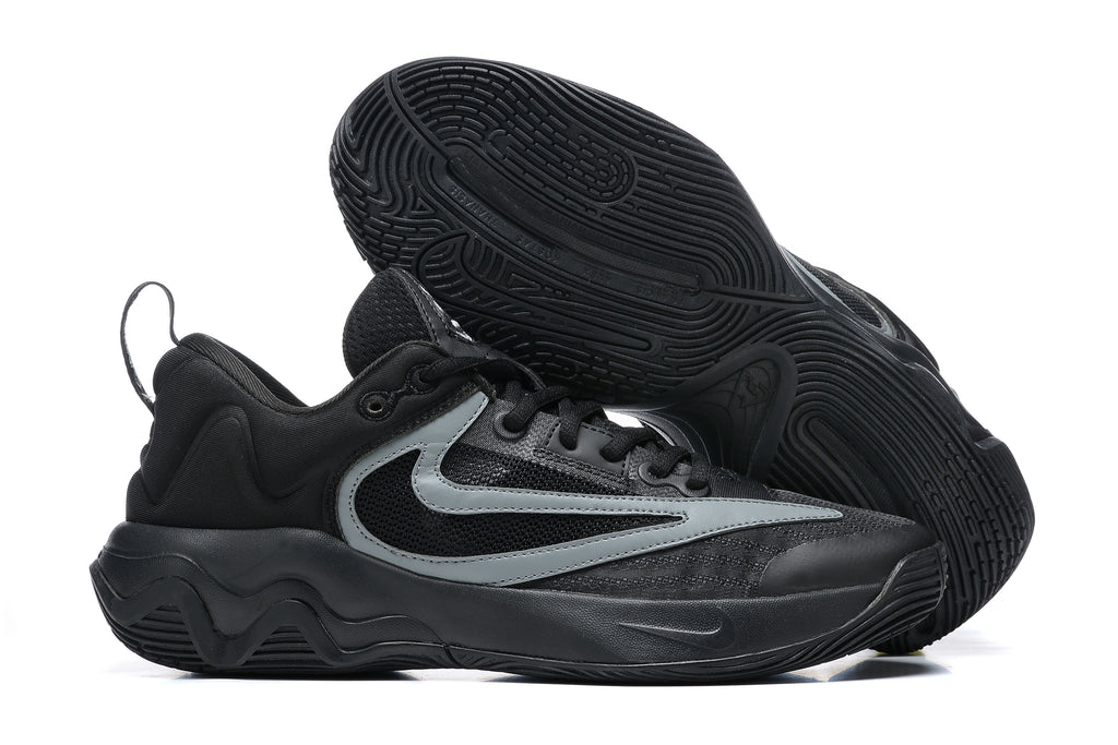 Black basketball shoe with gray side accents