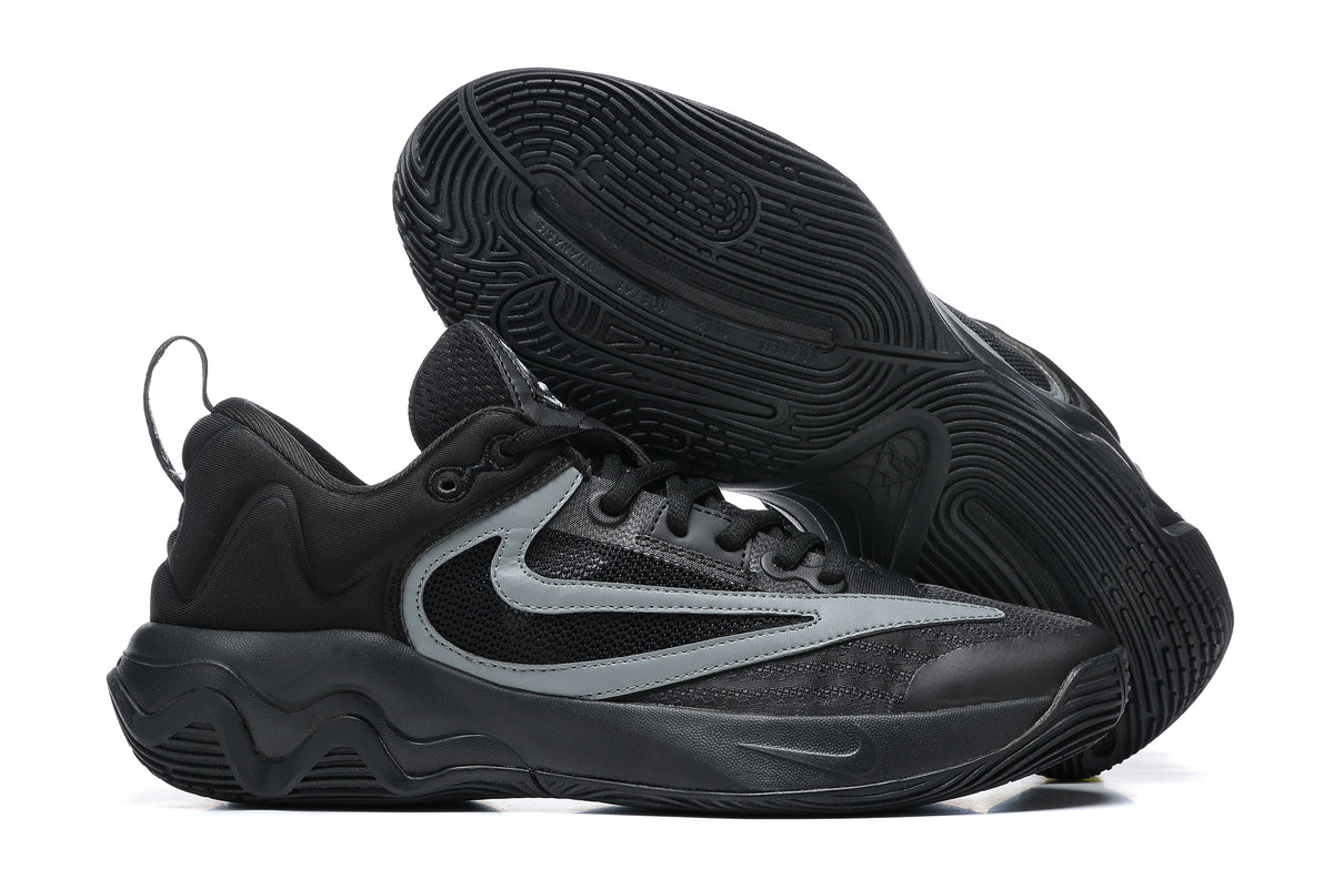 Black basketball shoe with gray side accents