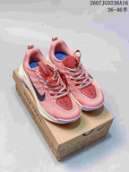 Pair of pink Nike Wildhorse 10 trail shoes displayed on a Nike shoe box.