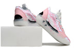 Pink and white Jordan 39 shoes shown from the heel and side.