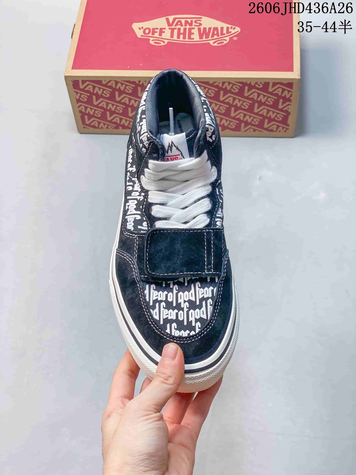 Top view showing white laces, a forefoot strap, and repeated Fear of God text.
