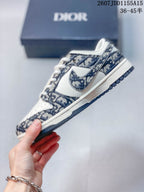Side profile of a low-top sneaker showing the patterned upper panels, Nike Swoosh, white midsole, and dark outsole.