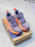 Pair of ASICS Superblast 2 sneakers in gray-purple with orange accents displayed on an ASICS shoebox.