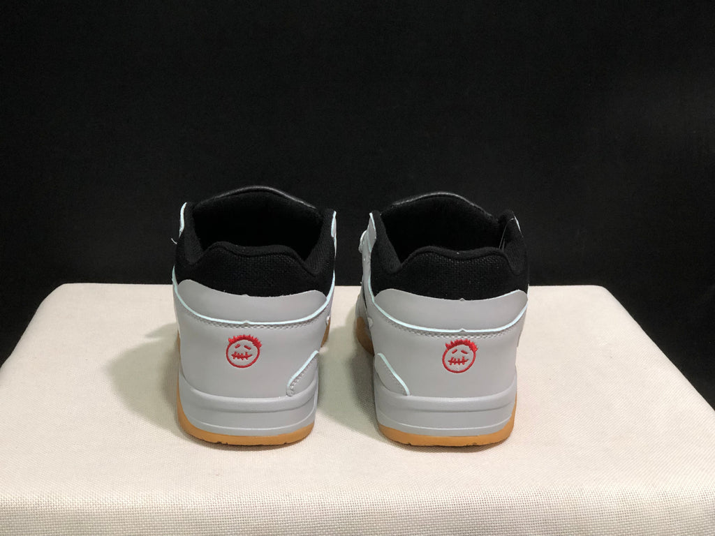 Rear view showing black padded collars, white heel panels, and red heel graphics.