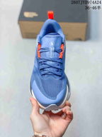 Top view showing the blue toe box, laces, orange accents, and Altamesa 500 tongue branding.
